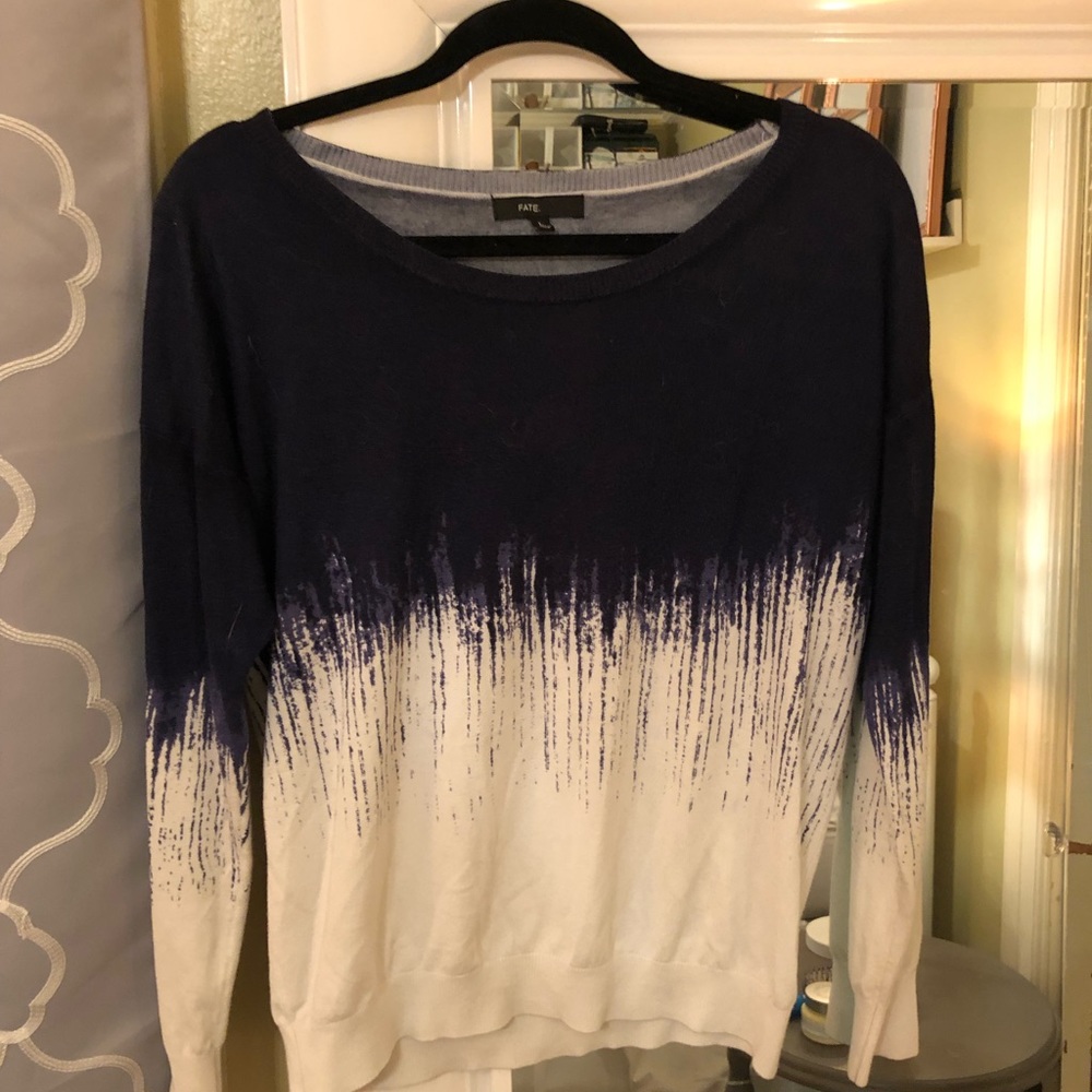 Blue and white sweater